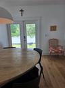 French doors leading to the back porch and yard creating a seamless indoor/outdoor flow perfect for entertaining