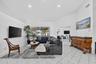 Vaulted ceilings and tile flooring enhance this bright interior