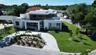 Approximately 1/3 acre lot.  Circle drive in front, oversize 3 stall garage in rear.