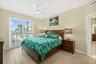 Guest bedroom with river facing balcony