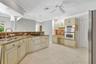Large open plan kitchen with granite countertops