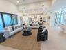 Great room with 13 foot ceiling, surround sound speakers, cat 6 wiring throughout, walls, ceiling sound insulated.