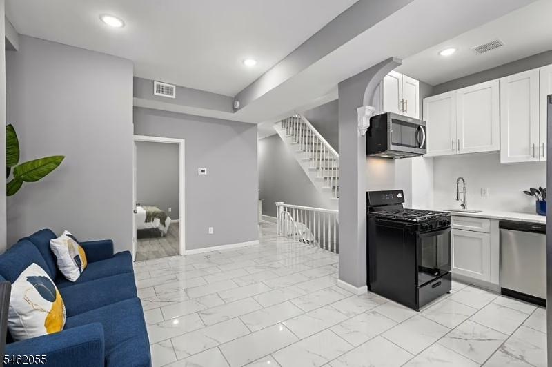 Living Area/View of Stairs