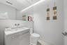 Wall-mounted faucet over an integrated sink and countertop