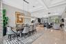 Dining Room with Polished Porcelain tile and custom lighting