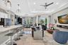 Open Concept Entry/Dining/Living Area with Beautiful view to Pool and outdoor oasis
