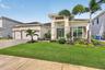 Lovely Front View with Custom Landscaping