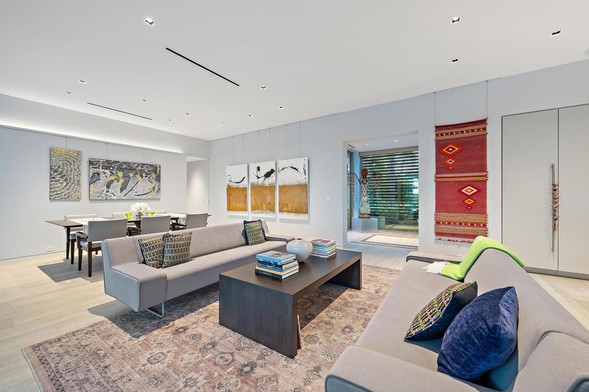 Recessed lighting, wood-finish flooring, and built-in storage