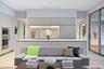 Contemporary kitchen with integrated appliances, extensive cabinetry, a large center island, under-cabinet lighting, and wood-finish flooring