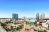 Expansive cityscape with architecturally diverse buildings and the Intracoastal Waterway.