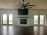 Large openLiving room with fireplace