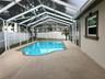 Perfect size in ground pool and screen cage for your outdoor entertainment