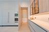 Dining area flowing into the living spaces with clean modern detailing