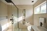 Master Bathroom. Original photograph. No AI-generated imagery.