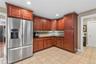 Cherry Cabinets and Stainless Steel Appliances