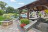 Exquisite Paver and Stone Work Embelish the Sunken Area