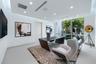 Sophisticated first-floor executive office featuring floor-to-ceiling windows, contemporary designer finishes, abundant natural light, and serene view