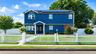 Two-story residence featuring a new exterior siding, trim details.