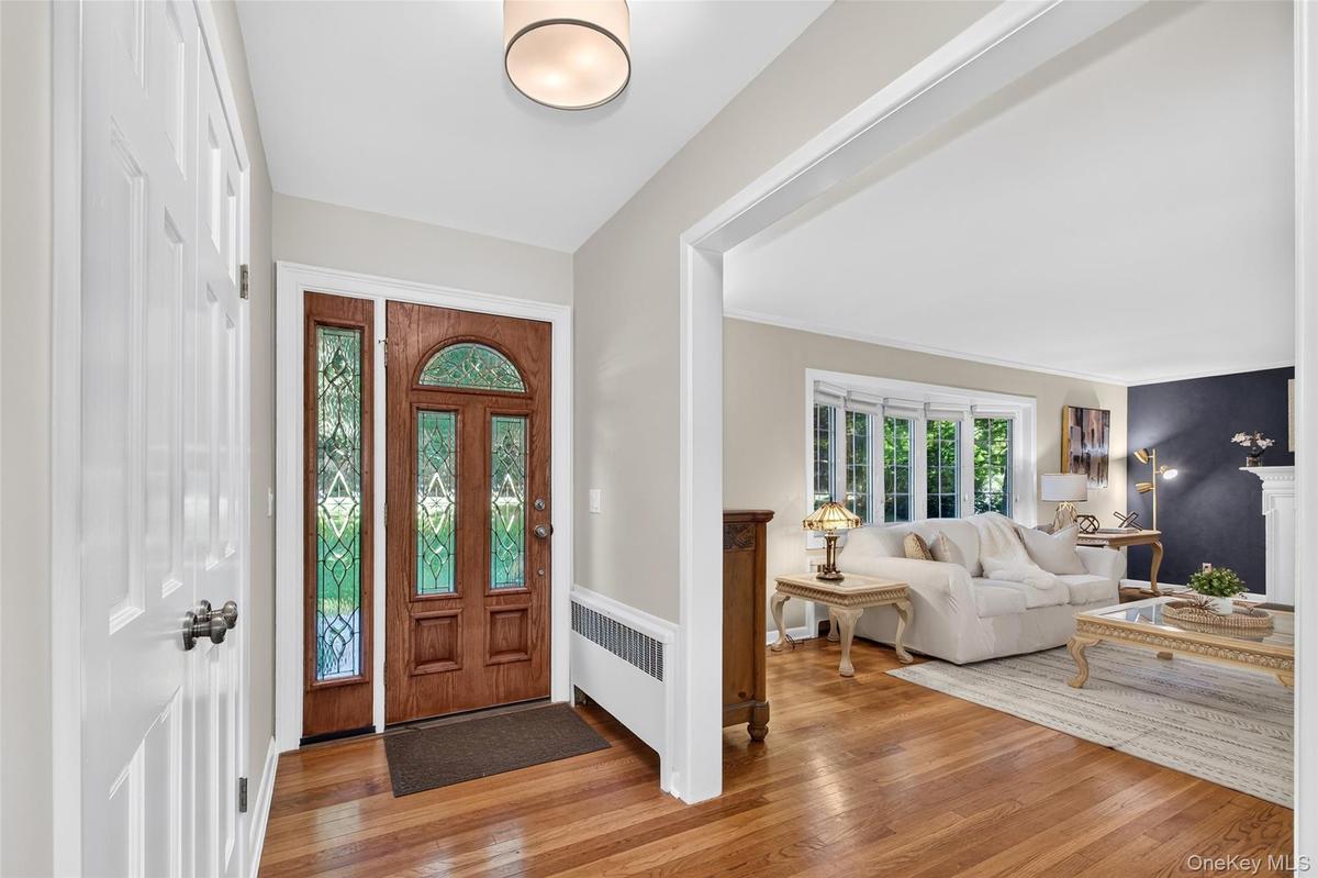 Spacious Entry Foyer with entry closet opens to livingroom