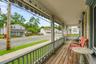 View from the front porch overlooking Main Street, offering plenty of space for outdoor seating.