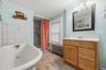 MAIN HOUSE - Another view of the full bathroom.