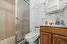 APARTMENT - Full bathroom with a walk-in shower.