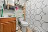 APARTMENT - Full bathroom with a tub and shower combination.