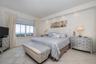MBR features great views of the coastline & opens to balcony!
