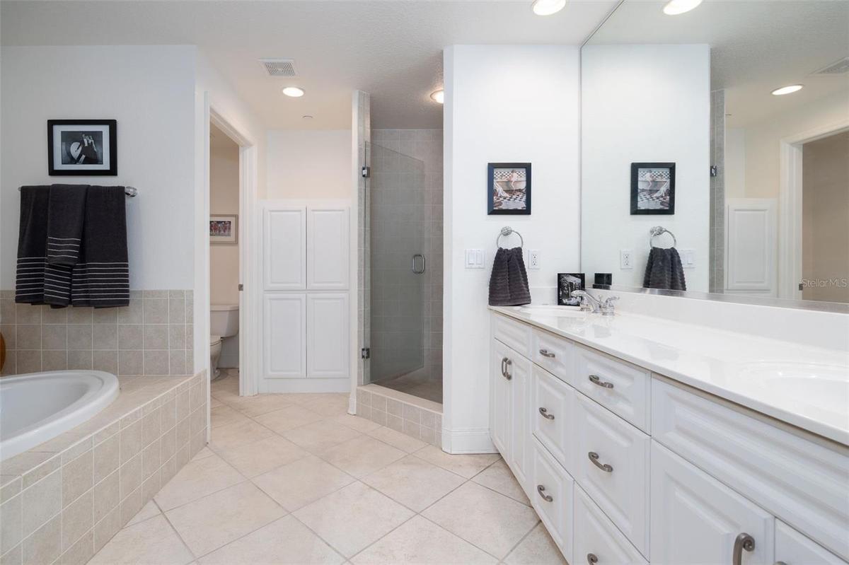 Master bath has two sinks, garden tub & step in shower.