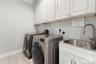 Laundry Room with Ample Storage and Large Sink