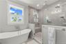 Dreamy Primary Bathroom with Soaking Tub and Large Walk in Shower