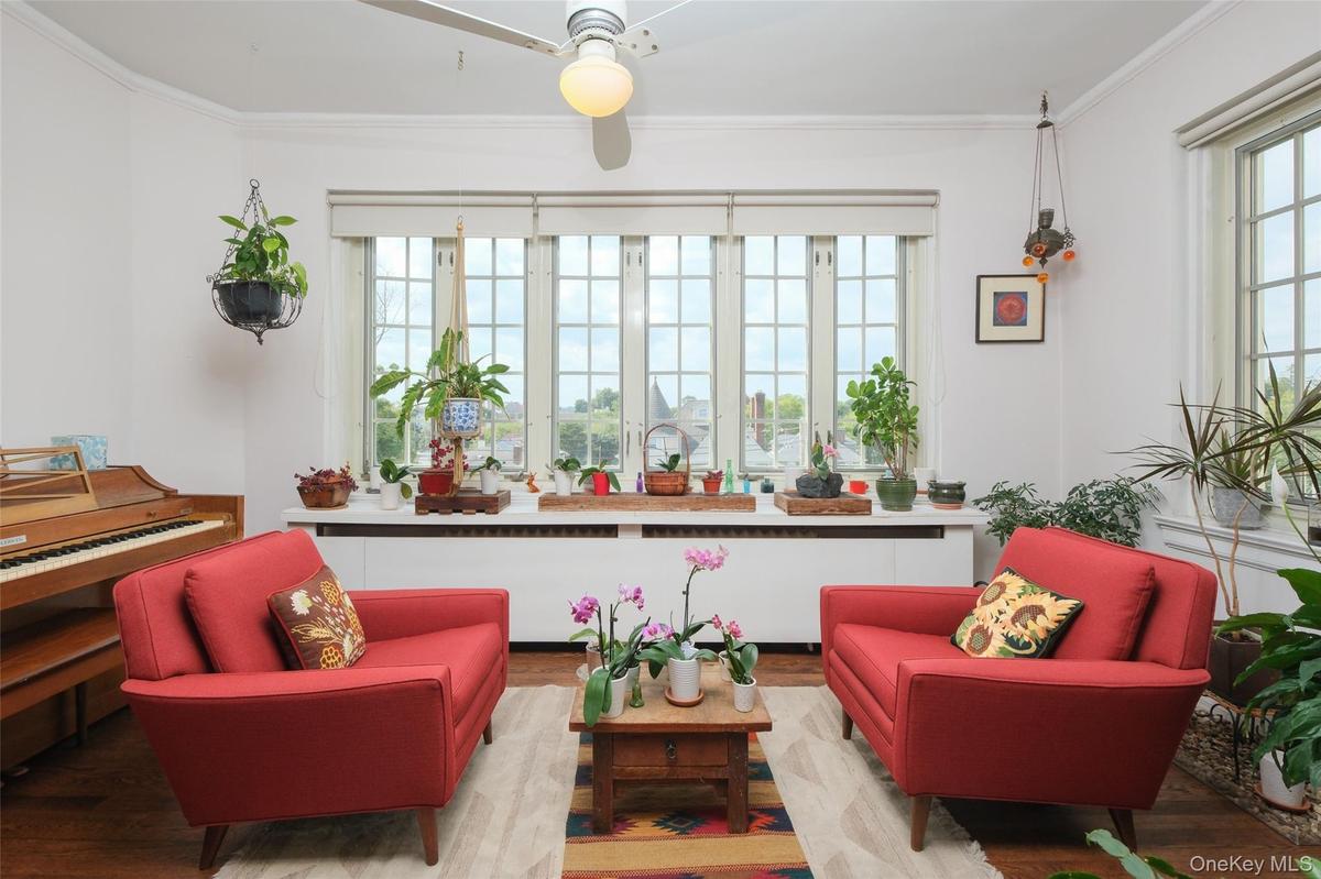 Apt. 4-B - Sunroom with west and north expsures.