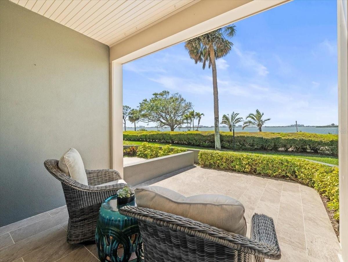 Private covered lanai and open waterfront patio