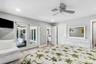 Master suite with French Doors leading to the pool patio