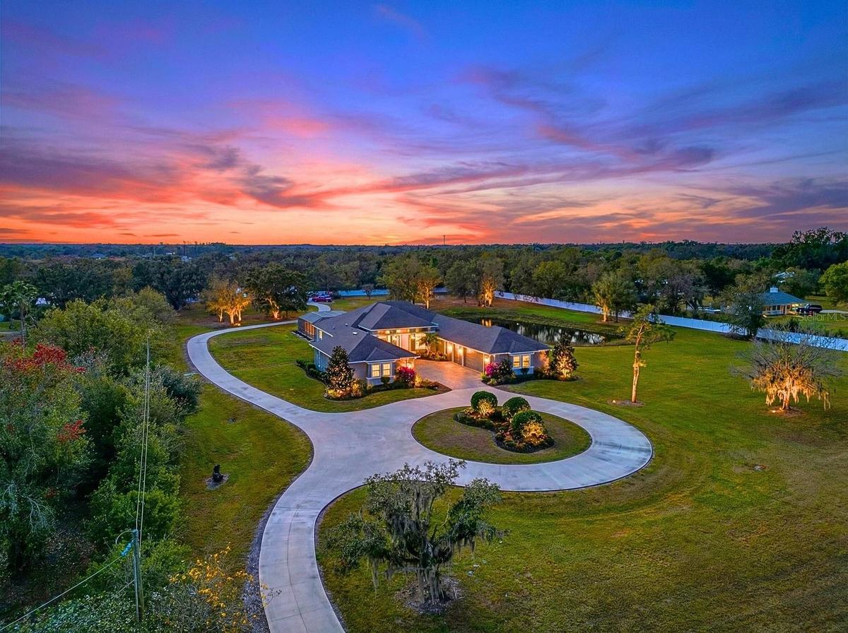 “Private 5+ Acre Estate with Multiple Buildings, Luxury Home, and Outdoor Living.”