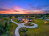 “Private 5+ Acre Estate with Multiple Buildings, Luxury Home, and Outdoor Living.”