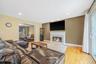 Living Room with Wood Burning Fireplace