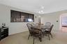 Dining Room is between the Kitchen and Living Room.