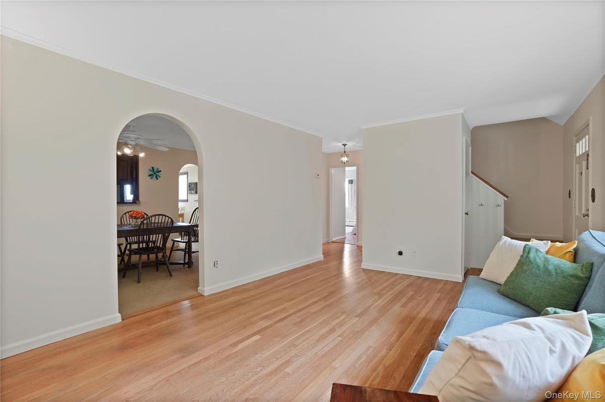 Living Room is adjacent to the dining room. Consider opening the wall to create a more open concept.