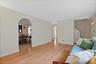 Living Room is adjacent to the dining room. Consider opening the wall to create a more open concept.