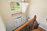 Stairs leading to bedrooms