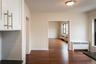 View from the Kitchen to the Dining Room into the Living Room
