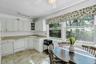 White cabinetry with brushed nickel hardware