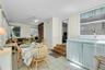 Tile flooring throughout, recessed lighting, ceiling fan, and painted walls