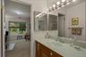 Bathroom with tub-and-shower combination.