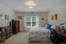 The second bedroom located on the second floor includes new double hung windows and closet.