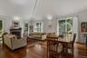 Beautifully well-balanced, the living and dining spaces flow seamlessly together while retaining distinct areas for relaxing and entertaining.