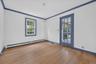 First floor bedroom with access to screened in porch