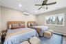 Bedroom featuring ornamental molding, recessed lighting, ceiling fan, and wood finished floors