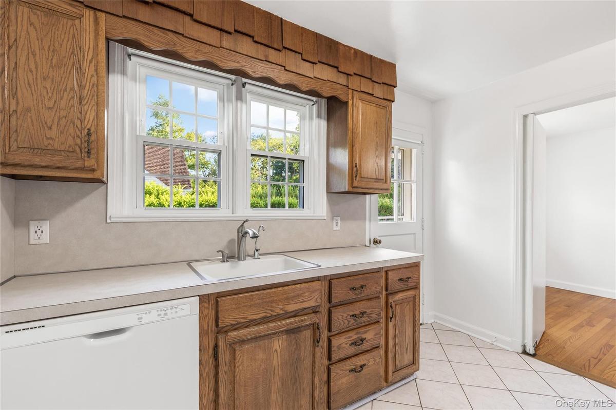 kitchen with door out to patio and yard